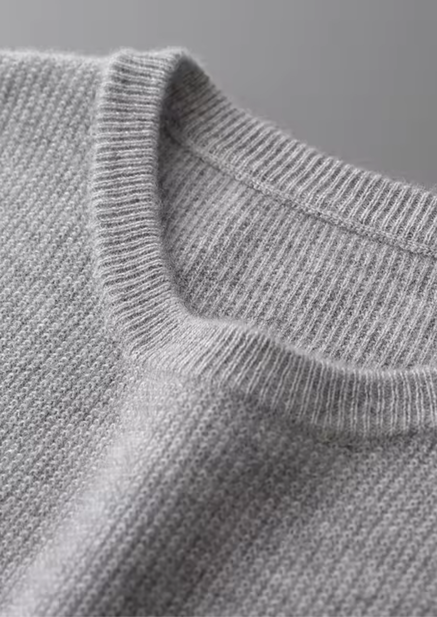 Gilet sans manches en tricot gris avec poche poitrine