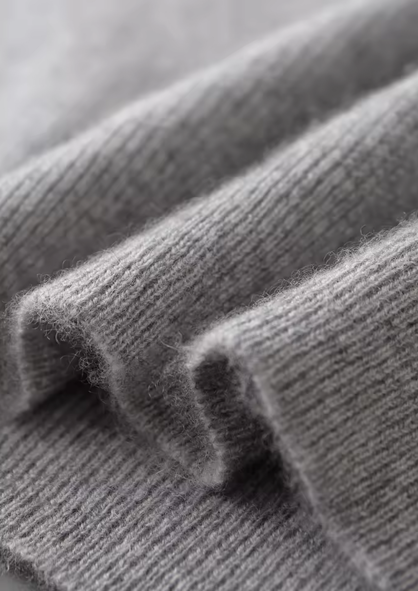 Gilet sans manches en tricot gris avec poche poitrine
