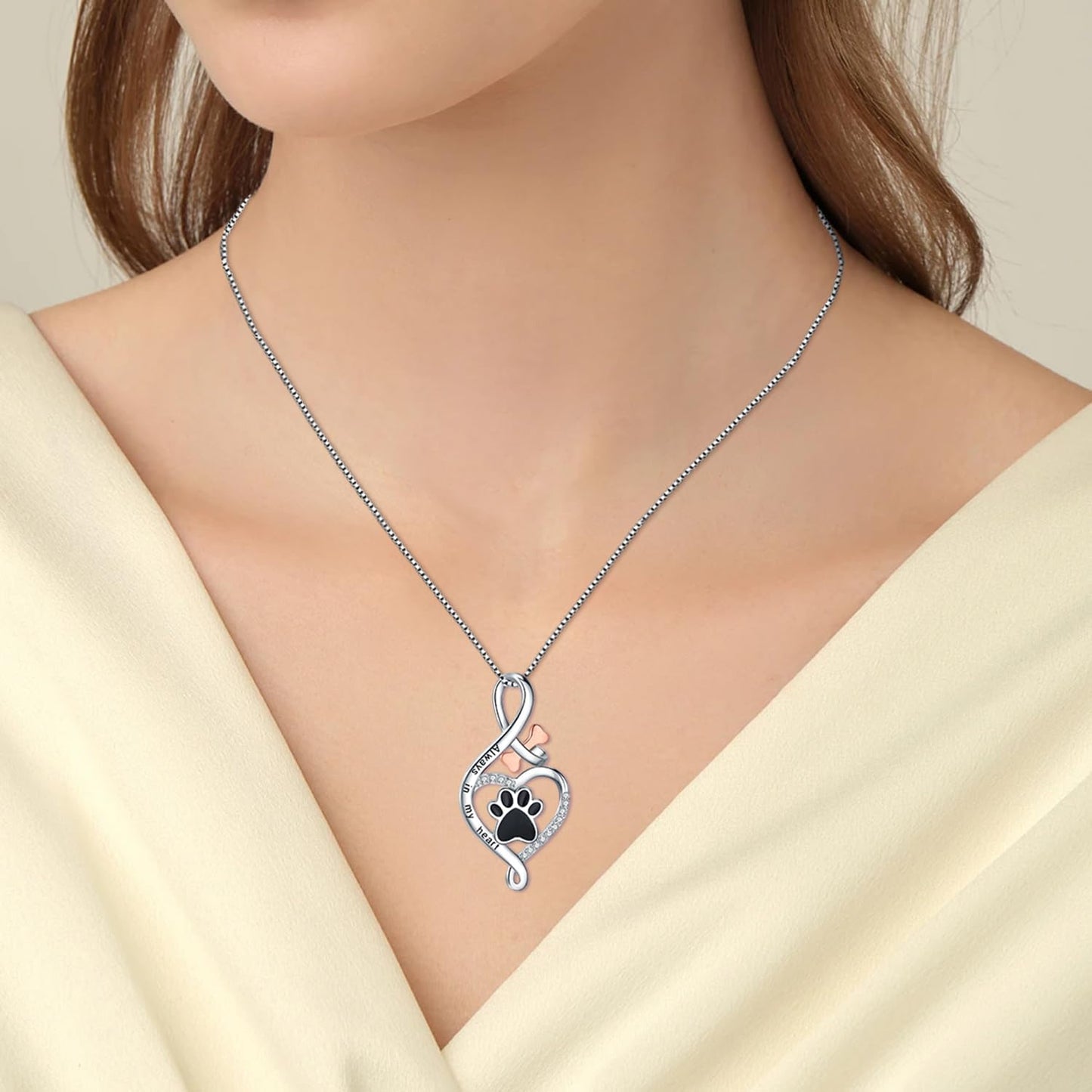 Gelukspootketting met hart-, bot- en oneindigheidssymbool