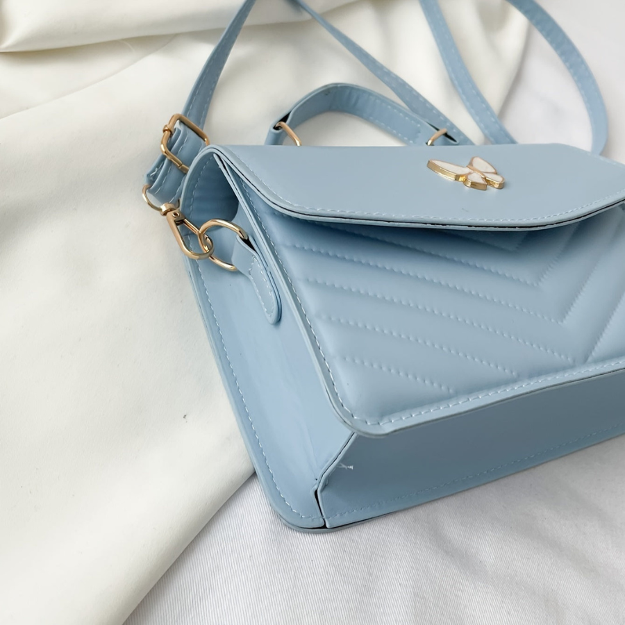 Serena - Petit sac carré papillon élégant avec options de transport polyvalentes