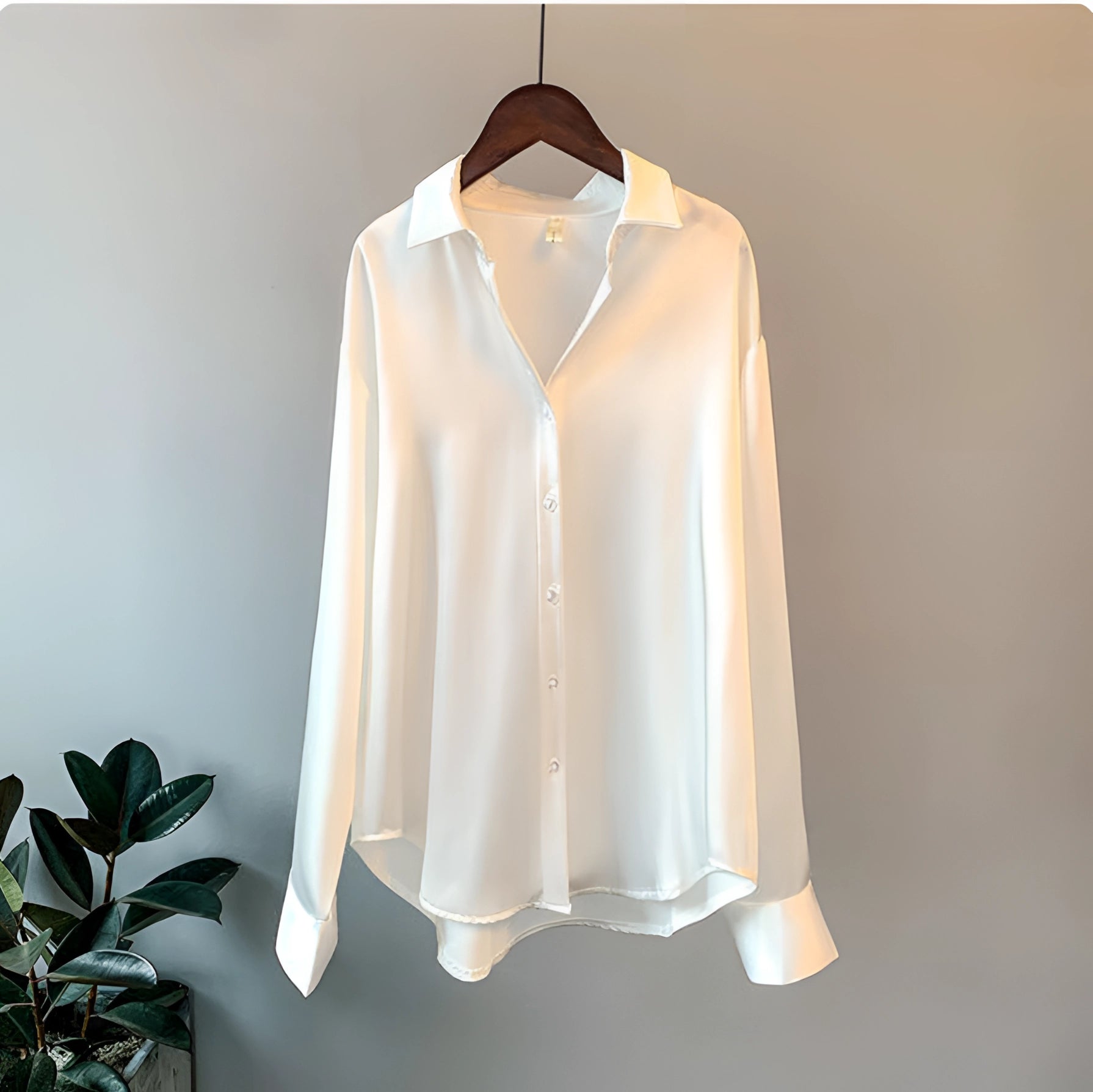 Elegant silk blouse for women in ice white color, featuring a luxurious satin finish with a button-up style, long sleeves, and a classic collar, size 3XL.