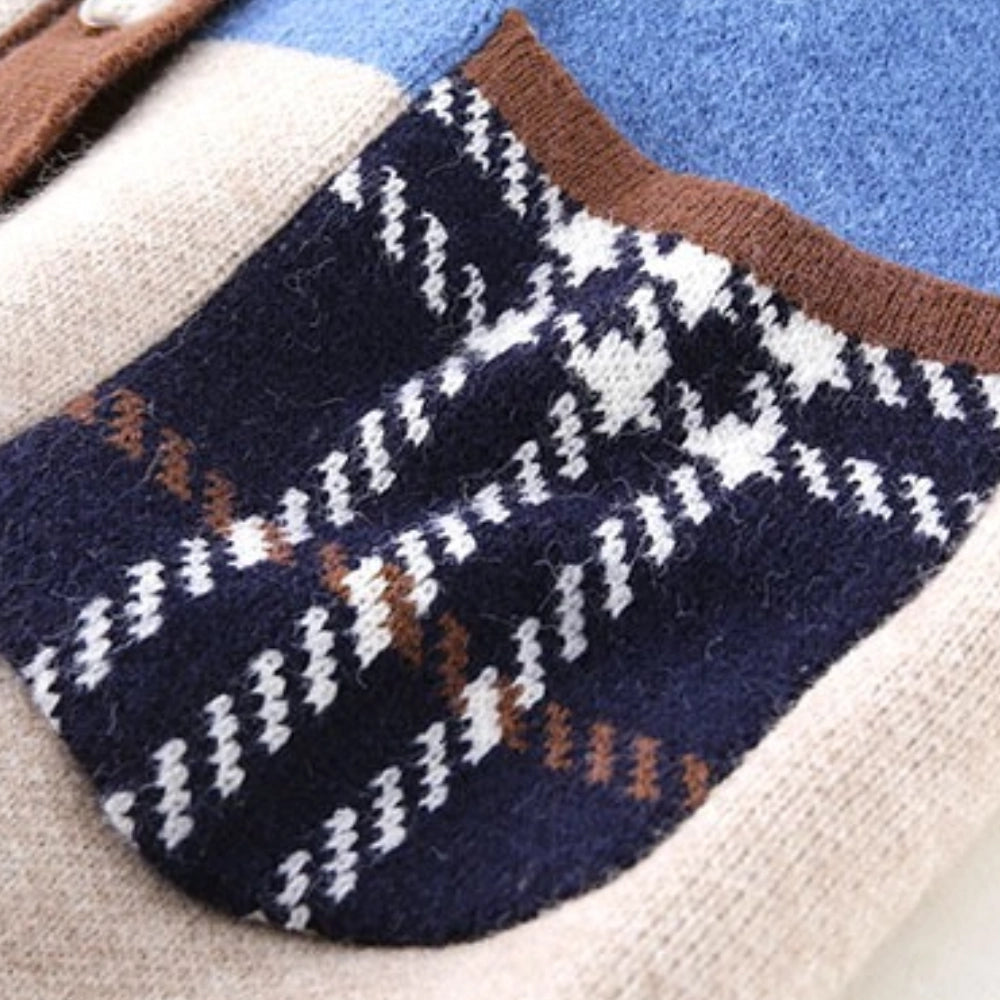 Oversized color block women's cardigan in geometric autumn knitwear design, featuring a mix of brown and electric blue patterns with woolen texture and long sleeves.