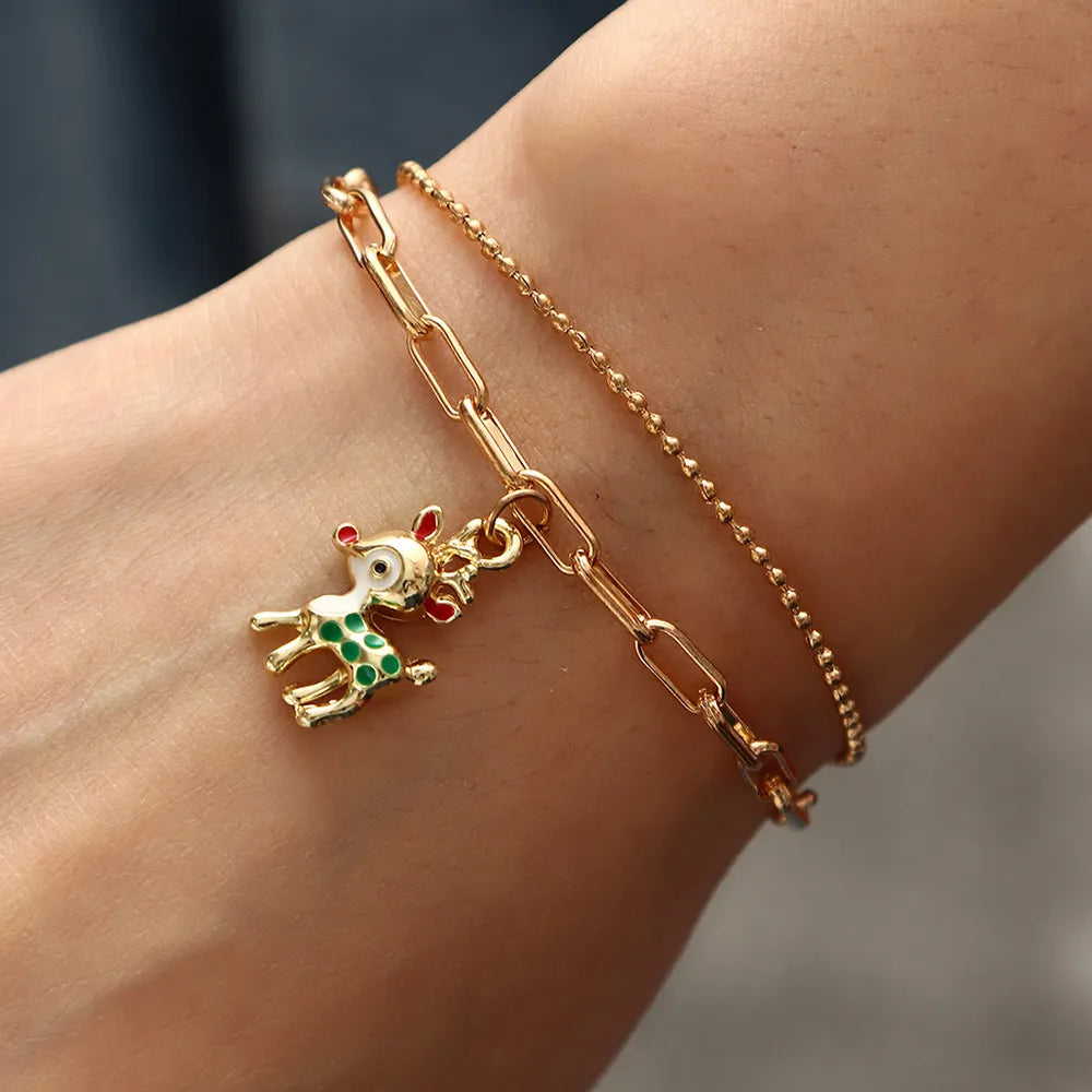 Doppellagiges Weihnacht-Charme-Armband mit Festtagsanhängern