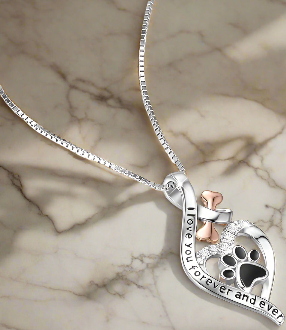 Gelukspootketting met hart-, bot- en oneindigheidssymbool